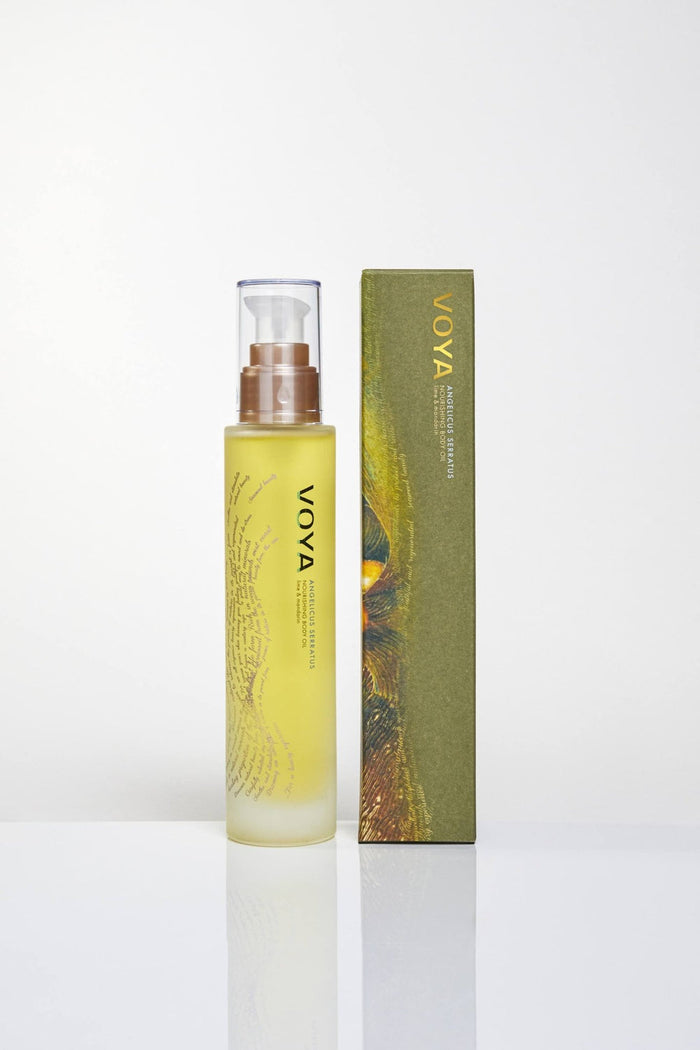 Bottle and packaging of Angelicis Serratus Nourishing Body Oil | VOYA with a clear pump dispenser and green decorative box, promoting skincare and body care wellness.