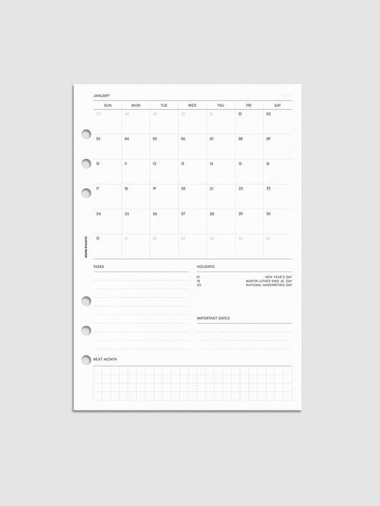 2027 Dated Monthly Admin Inserts in A5 6-Ring Punch size, shown as a styled flat lay mockup.