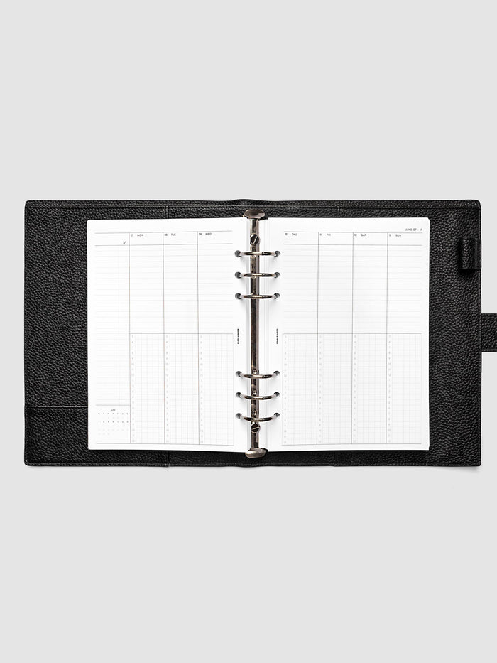 A5 6-Ring Punch weekly time block spread showing left and right pages in a planner