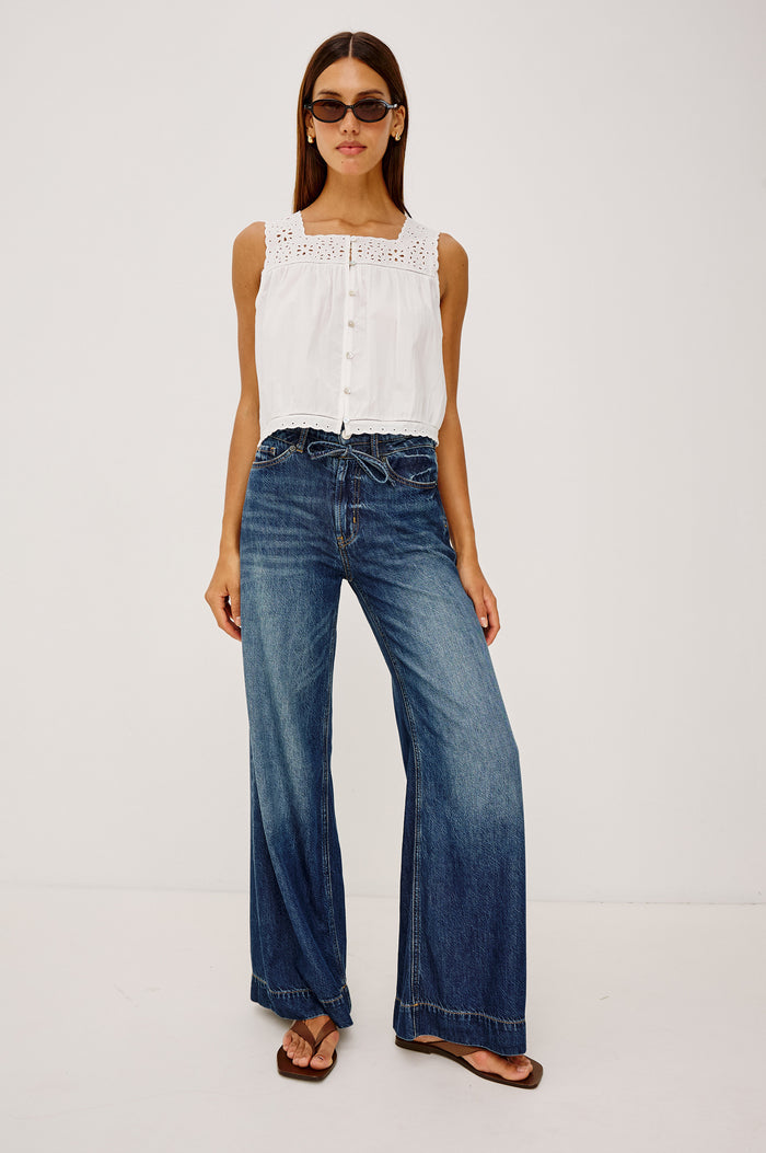 Dover High-Rise Palazzo Jean in Rigid Denim With Relaxed Fit, Zip Fly, Adjustable Waist Ties, and Wide, Drapey Legs in Boondocks Colorway - Full Body Front View Featured on Model