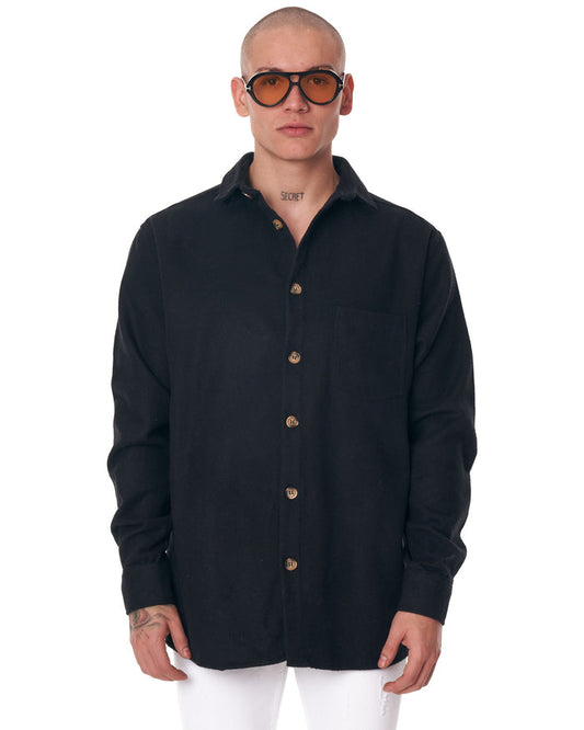 Martin Valen men's black lumberjack shirt, front close-up showing open collar and wooden buttons