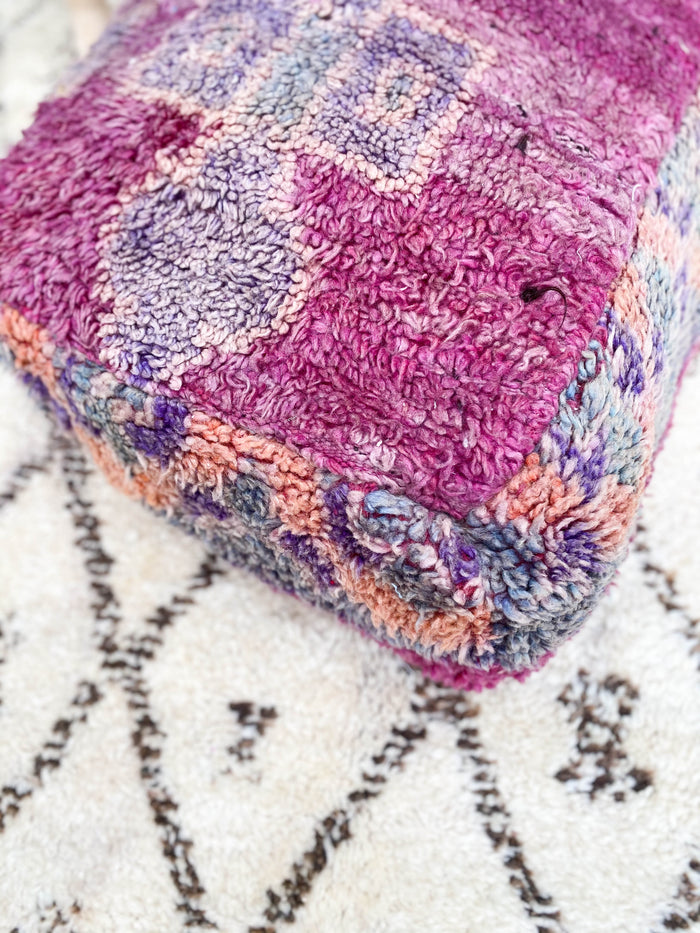 Moroccan pouf vi made using a vintage beni mguild rug